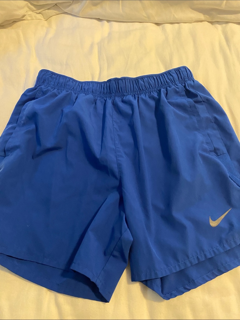 Nike Men’s Royal Blue Athletic Shorts with Gold Swoosh